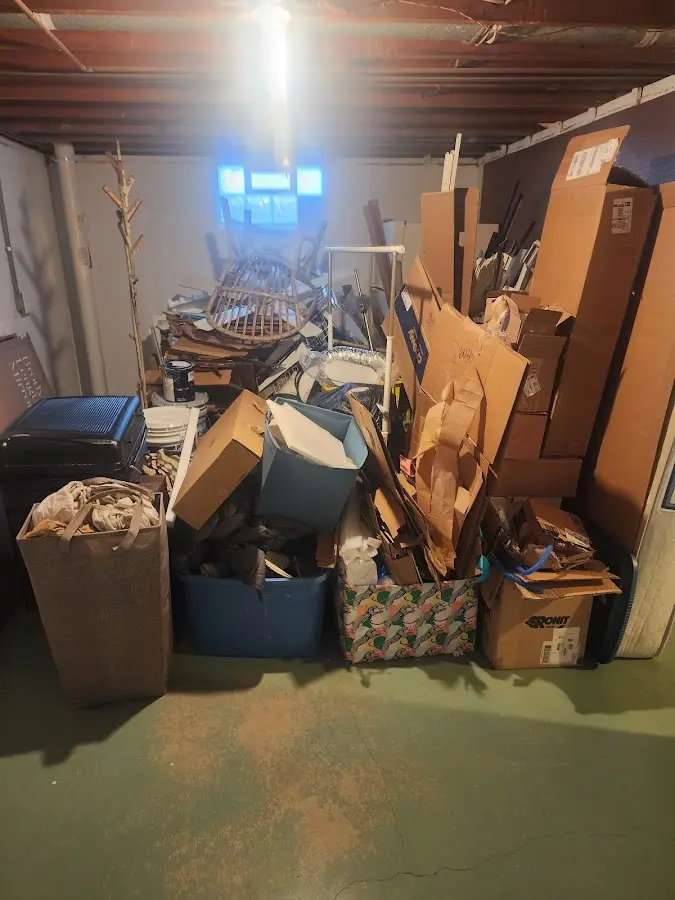 Roll-off dumpster container at job site for Yard Waste Dumpster Rental in Huron